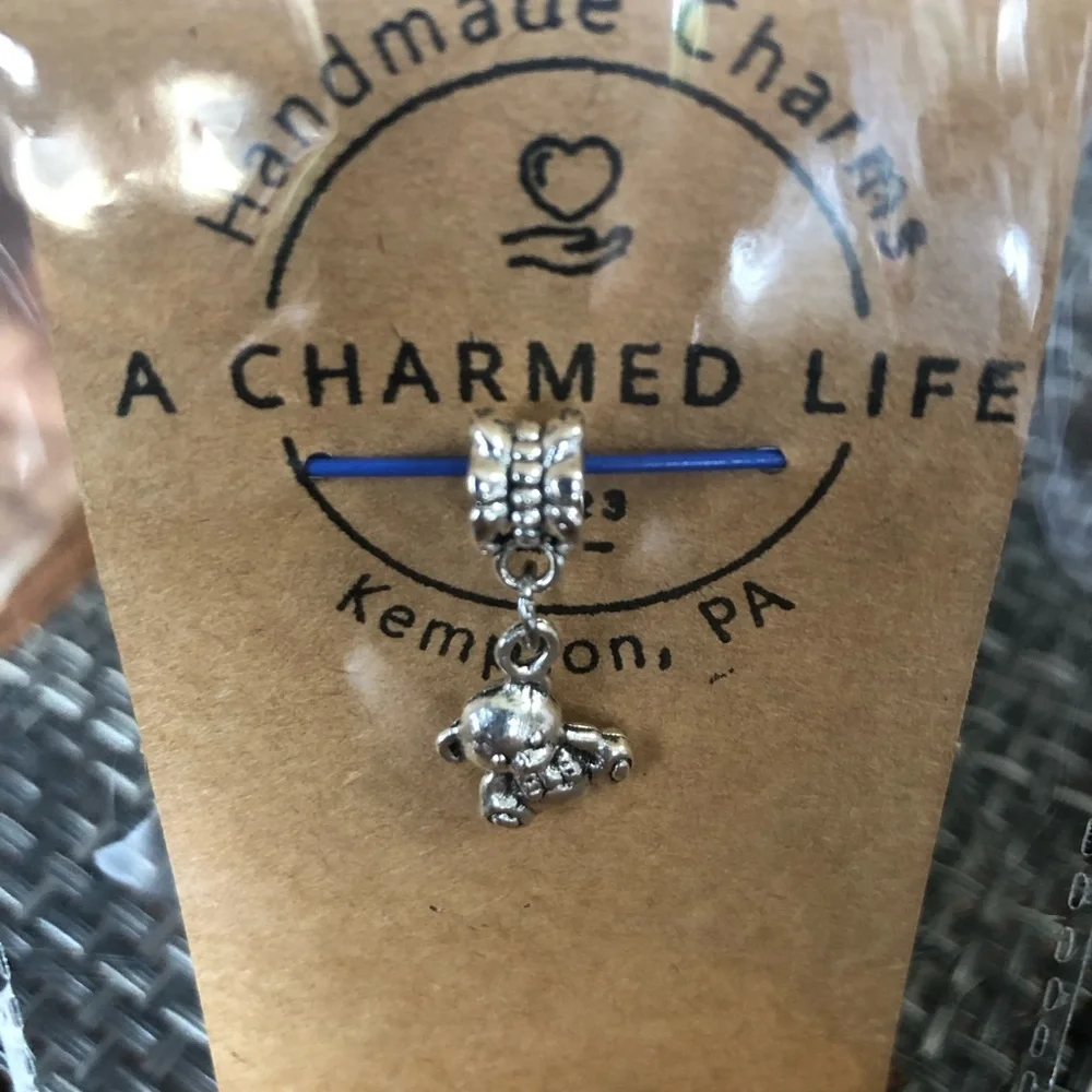 NWT, Handmade by A Charmed Life. Two Sided Silver Teddy Bear on Bail